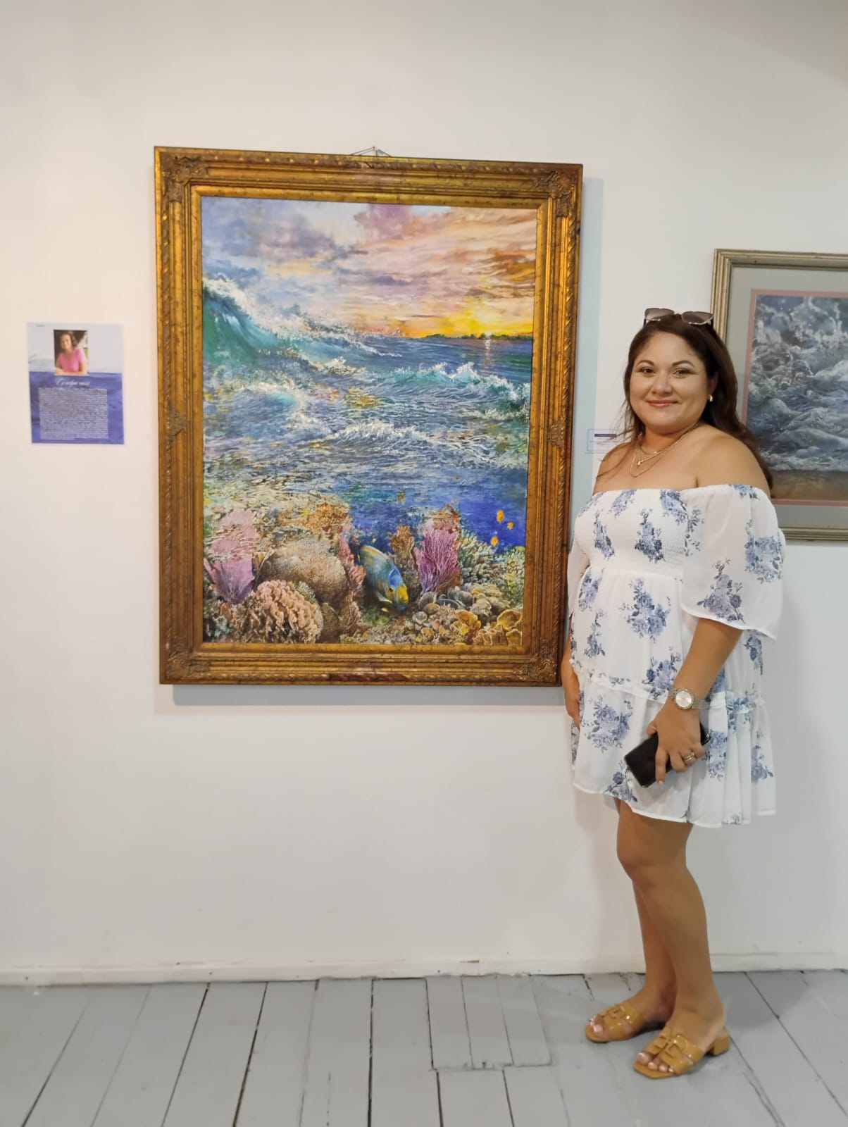 Reyna Gallery Co-owner Janet Reyna with Carolyn Carr painting